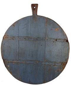 F119 19th century Peel board was used in England to peel potatoes. One side is in original stunning blue paint and the other side is a rich old natural patina the wood is pine. The runners on the painted side were used to give a sturdy surface while being used Measurements are 26" long x 21" tall