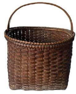 **SOLD** L5 Heavy construction woven splint Gathering Basket with sturdy steamed and bent handle bearing natural patina surface. Basket construction boasts a tightly woven decorative double rim with round opening tapering to a square bottom. Measurements: 13 ¼ x 13 ¾ top opening. Bottom is 10 ¾ square. The sides are 10 tall. Overall height is 15 tall.