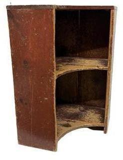 M1142 19th century Pennsylvania Hanging Corner Cupboard with the original dry red paint, the shelfs are mortised into the sides, with a painted interior that is nice and clean. The backboards are held in place with handmade nails.