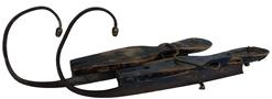 RM1043 19th c wooden skates with high steel curls ending in brass acorn finials. Shoe is 10 1/2”, 14” including curl. Traces of bittersweet and royal blue paint .