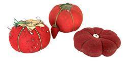 K1778A This is a group of handmade early 20th century tomato pincushions in cotton with a green felt cap. Stuffed with sawdust. There are three in the group. Approximate measurements: 2 ½ dia. x 1 ¼ tall, 3 ¼ dia. x 5/8 tall, and 2 ½ dia. X 1 ½ tall.