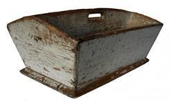 J453 Mid 19th century original gray painted cutlery tray / knife box bearing canted sides and slightly raised center with cutout handle for carrying. A nice bevel edge surrounds the bottom board. Great wear indicative of years of use. Square head nail construction. Circa 1840s. Measurements: 13 ¾ x 9" x 6" tall (center).