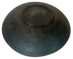 **SOLD** RM1563 Early 19th century New England wooden turned bowl in original blue paint. Bowl is slightly out of round, features a band around the rim and shows strong evidence of slow lathe turning on both the interior and exterior. Natural patina interior with a few surface age cracks that do not go all the way through the bowl. Great wear from years of use. Measurements: 12 ¼ x 11 ½ diameter. 2 ¼- 2 ½ tall, depending on where measured.