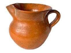 **SOLD** K1835 Beautiful orange glazed (Tobacco) Jugtown Ware Pottery Pitcher from Jugtown, North Carolina. Stamped Jugtown Ware on bottom. Great condition. Measurements: 7 ¼ across spout to handle. 3 ½ diameter bottom. Stands 5 ¼ tall.