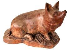 K1842 Hand Carved Wood Pig Sculpture signed by maker � C. Logue. Solid wood with exceptional carved details, including a curled tail, pointed ears, wrinkled upturned nose and characteristic eyes as well as cobs of corn around the pig�s front feet. Heavy, solid wood earing original natural surface. Approximate measurements: 11 &frac14;� long x 6 &frac12;� wide x ~ 7� tall.   