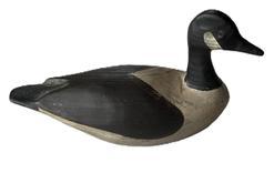 L30 Miniature Canada Goose Decoy � signed and dated �Victor Berg 11/90� on bottom. Victor �Vic� Berg is a decoy carver from the Outer Banks of North Carolina. Original surface featuring painted eyes and slightly raised wings. Approximate measurements: ~7 &frac34;� long x ~ 2 &frac34;� wide x ~4� tall.   