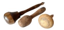 K1700A Group of 3 early wooden sock darners. One is marked Germany on the top. Measurements: 4 ½ long, 7 long and 9 ½ long.