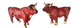 K130A Set of two Cast Iron Oxen bearing original red and white painted surfaces made by the Hubley Manufacturing Company of Lancaster, Pennsylvania. Circa early 1900s. Approximate measurements: 6 ¾ long x 2 ½ wide x 4 ¼ tall.