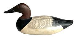 L378 Canvasback Duck Decoy carved by Paul Gibson (1902-1984) Havre de Grace, MD. All original paint and condition, with no evidence of ever having a weight on bottom indicating it was perhaps a mantle duck -approximately circa 1930's.  Gibson was a hunter and fireman with the Edgewood Arsenal. He retired in 1965 as the Department Chief (McKinney 41). In 1915, Gibson began using his spare time to make decoys. 