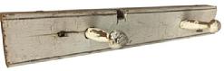 D416 Late 18th century Pennslyvania Peg Rack with two pegges in old dry white painted surface, crca 1790 measurements are: 20 1/2" long x 3 1/4" tall
