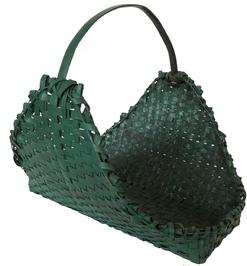 F40 Oversized Flower Gathering Basket with Handle. Great rectangular form with tall tapered and slightly curved sides, double wrapped rim, and a steamed and bent wood handle. American, 19th century. Bottom measurements: 20 1/2”long x 8 1/2” wide with 2 3/4” tall ends; Opening measurements: 22 1/2” long x 17 1/4” across top; Height: 18 3/4” tall at handle