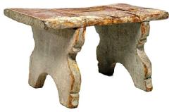 M256 18th century Small wooden stool featuring decorative cut out legs that are fully mortised through the top. Old red painted surface over the original gray paint.