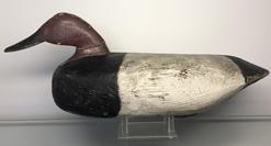 E271 Eastern Shore Virginia Canvasback Drake decoy, original worn paint, head and neck are notched and inset into the body. tight crack to the neck otherwise in good condition, unknown maker circa 1950's