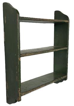 **SOLD** L48 Mid-19th century Mid-Atlantic hanging wall shelf with three shelves and shaped ends retaining its old green painted surface. The shelves are mortised into the sides and bear double-beaded edges. Square head nail construction. The wood is yellow pine. Circa 1850s. Measurements: 24 ¼ wide x 6 ¾ deep x 30 ¼ tall.  