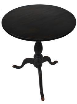C349 Early 19th century New England Carved Cherry Candlestand, with the original black paint , circa 1800 , circular top on a gracefully turned pedestal support with three tripod leg base and ending in snake feet, Measurements are 22” diameter x 26 1/4” tall