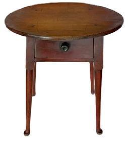 **SOLD** L467 18th century New England Queen Anne splay leg table with canted, dovetailed drawer and padded feet in original red painted surface. The beautiful one-board oval top is secured to the apron with wooden pegs and the drawer stretchers and apron boards are fully mortised and pegged into the delicately turned splay legs. Measurements: 19 ½ wide x 15 ½ deep x 22 ½ tall.