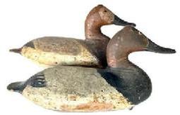 L259 Rig Mate Pair Canvasback Decoys carved by Will Heverin (1860-1951) from Charlestown, Maryland bearing very early working repainted surfaces. Both are Branded PM on bottoms of tails which stands for the Paul Murphy Rig. These were found in a rig in Kennedyville, MD.