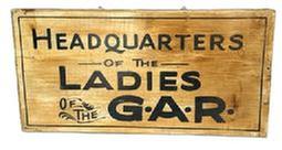 RM1620 Single sided wooden sign advertising “Headquarters of the Ladies of the G.A.R.” in black lettering on a discolored white painted background. Original eye hooks remain in the top for hanging purposes. Unsigned. Measurements: 21 5/8” wide x 11” tall x 7/8” thick. (NOTE: The Ladies of the G.A.R. refers to the “Ladies Grand Army Republic” – a Women’s Auxiliary Organization founded in 1866 for the mothers, daughters, wives and sisters of Union Veterans of the Civil War that is dedicated to preserving the history of the Union and advocating for veteran’s rights and benefits.)