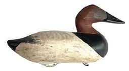 L386 Canvasback Drake Decoy carved by R. Madison Mitchell (1901-1993) of Havre de Grace, MD. Decoy is Branded "HMcM" (for the Harold McMullen Rig) on bottom. Original painted surface - Electric pen signed by R. Madison Mitchell - and dated 1948 on bottom. Original weight, staple and ring remain intact on bottom. Evidence of being shot over is present throughout.