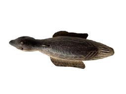 J351 Hand carved Folk Art Baby Duck shaped fish decoy featuring original detailed painted surface and glass eyes. Wooden body with stationery tin wings and loose tin feet featuring painted details on all tin to match the body paint. Solid wood body with a metal weight embedded into the ducks underbelly. From a Wappinger Falls, NY collection