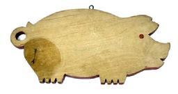 L187 Early 20th century Pig Cutting Board with original dry red painted edges and eyes. Both sides show wear from years of use. Found in Pennsylvania. Early iron eye hook remains intact on top for hanging / display purposes. Measurements: 14 ½ long x 7 1/8 tall x ¾ thick
