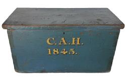 i856 19th century Pennsylvania Document Box with spectacular blue painted surface bearing "C.A.H. 1845 exceptionally hand painted in mustard with black painted shadowing on the front. Natural patina interior. Dovetailed case. The wood is pine with square head nail construction. Measurements: 20 ¼ wide x 10 deep x 10 ½ tall.