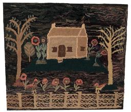 E51 Early New England Hooked Rug depicting a house with grassy yard, several trees, beautiful flowers and two oversized birds perched upon an elaborate fence which stretches along the length of the foreground.