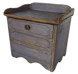 F132 Late 19th century miniature wash stand, retaining it original paint decorated color, with a single drawer and applied gallery. It is all original