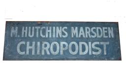 Sign for M. Hutchins Chiropodist ( foot Doctor) painted on one wide board Measurements 14"Tall x 40 1/4" long