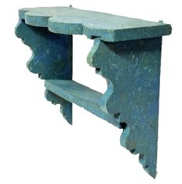 M1131 Late 19th century small Pennsylvania wall shelf with decorative cut out ends and scalloped edge along the front bearing old blue over the original blue painted surface. The wood is pine. Mortised ends/shelves. Circa 1870s1880s. Image Properties