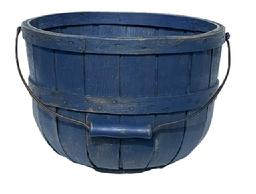 M332 19th century Apple Basket in old blue painted surface having fantastic form. The basket is sturdily constructed of oak splints with a swing bail handle. It has a wooden bottom from which each slat is attached with small iron nails securing each slat. Remains in superb original condition with an extremely fine surface displaying oxidation and very light wear. Circa 1880 - 1900. Measurements: 12 3/8 top diameter x 7 base diameter x 8 ½ tall sides.