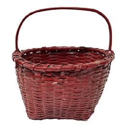 M306 19th century Pennsylvania gathering basket in early old lipstick red paint. Single wrapped, double rim with tightly woven sides. Steamed and bent, notched handle is woven into the sides. Evidence of very early home / "make-do" repairs on the basket's bottom appears to have been for reinforcement purposes. Basket has losses but is sturdy and displays great! The 12 ½ x 13 ½ diameter opening tapers down to a 7 ½ square base. Sides are 7 ½ tall. Overall height at handle is 13 tall.