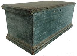 SB3 Diminutive Pennsylvania Blanket Chest in original dry blue paint. Construction consists of 6 beautifully dovetailed white pine boards with applied base and a till mortised inside. Measurements: 13½” Deep x 29¼” long x 11 ½” tall.