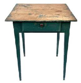 L389 19th century North Carolina original green painted one drawer table resting on tall, gracefully tapered Hepplewhite legs. The drawer stretchers are mortised through both front and back of the apron. The legs are fully mortised and pegged into the apron. The top is secured with wooden pegs and square head nails. Drawer is mortised / nailed construction. The wood is yellow pine. Measurements: 25 ¼ wide x 25 ¼ deep x 30 ¾ tall.