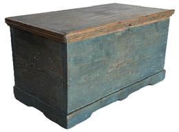 **SOLD** CM5 Late 18th century Mid-Atlantic miniature blanket chest retaining original blue painted surface with applied reeded molding around the lid and an applied bracket base. Clean, natural patina interior. Six board yellow pine wood with small rosehead, and T nail construction. Measurements: 20 ¼ wide x 10 5/8 deep x 10 ¼ tall.