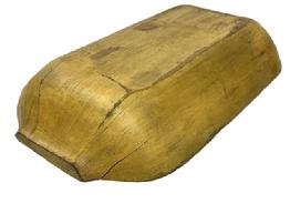 M242 Early 19th century hand-hewn wooden trencher with carved handles bearing its original old mustard painted surface. Natural patina interior with evidence of significant chop and tool marks from years of use. Very sturdy, even with early age crack to one end that does not affect the integrity of this item. Circa 1830s 1840s. Measurements: 19 long x 10 ¾ wide. Height varies between 2 ¾ - 3 ¼ tall, depending on where it is measured.