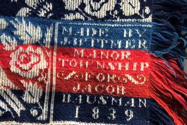 E383 Exquisitely woven heavy linen/wool Coverlet dated 1839 from Manor Township in Lancaster County, PA. Two corner blocks read: “Made by J. Witmer For Jacob Bausman”.