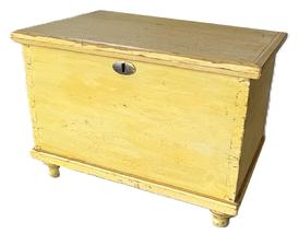 L21 Sweet 19th century Pennsylvania miniature Blanket Chest with original chrome yellow painted surface. Dovetailed case with applied molding around both top, and bottom  resting on applied turned feet.  Clean, natural patina interior. The wood is pine with small square head nail construction. Circa 1870s. Measurements: 16 wide x 10 ½ deep x 11 tall.  