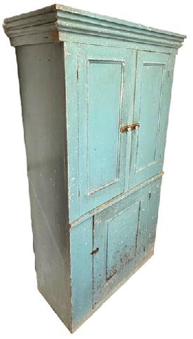 **SOLD** L110 19th century Maryland flat wall storage cupboard with two doors over one door configuration. Cupboard retains an old blue painted surface over the original gray paint  with an oyster white interior. Bold molding surrounds the top. Each panel on the top doors is surrounded by molding. The bottom door features a deep raised panel. Doors are fully mortised and wooden pegged. Case is square head nail construction. The wood is pine.  Measurements:  41 ¼ wide x 17 ¾ deep x 72 ½ tall. 
