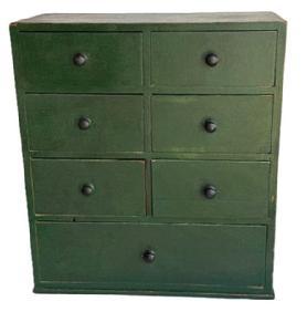 L371 18th century Pennsylvania seven (7) drawer apothecary beautiful old green painted surface with all the original knobs. Dovetailed case and drawers with the stretchers being dovetailed into the sides and mortised through the top. The wood is pine. Circa 1790-1810. Measurements: 18 wide x 9 deep x 20 ¼ tall.