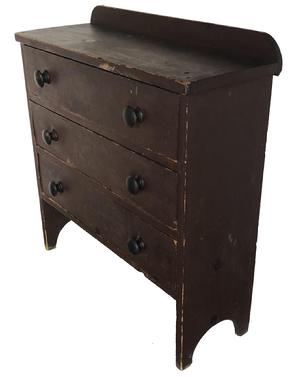 E407 Early 19th century New Hampshire painted pine chest of drawers, Circa 1810 -1820, having three drawers, retaining an early reddish brown original surface, high arched cut out feet, the drawer dividers are mortised into the sides, thick one board square head nail construction 32 1/2" h., 31" w., 11"