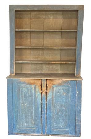 F177Early 19th century Maine Stepback Cupboard which is two parts, open top over two raised panel doors showing wonderful wear to the paint and doors. Circa 1820