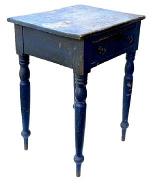 M150 Early 19th century Lancaster County, Pennsylvania one drawer turned leg side table with original blue painted surface and gracefully turned Sheraton style legs. The drawer is dovetailed front and back. The apron is mortised into the legs. Circa 1850s. Measurements: 21 ¼ wide x 17" deep x 29" tall.
