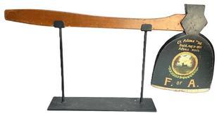 L380 Late 19th century Folk Art style ceremonial wooden Axe for the fraternal benefit society known as the Foresters of America (�F. of A.�) featuring their logo of a deer in the woods with �Ct. Adams #116� �Instd. Aug 31-1896� �Adams Mass.� painted above the logo, and �F. of A.� painted below the logo. In translation, this represents the Foresters of America Chapter � Adams #116, Instituted August 31st, 1896, in Adams, Massachusetts. Solid wood construction with the handle being fully mortised through the head of the axe. The custom-made metal stand is included for display purposes. Measurements of the Axe: 30 &frac12;� long x 1 1/8� thick x 13 &frac12;� tall. Overall height mounted is: 15 3/8� tall. 