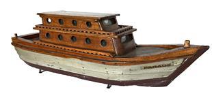 **SOLD** K1640 Early handmade Folk Art wooden boat model with the name �PARADE� on one side of the bow. Great details include scalloped railings, round and oblong windows with what appears to be real glass, shiplap sides and a full wooden keel that extends the length of the boat. Small wire nail construction. Mixed woods. Measurements:  24� long x 6� wide x 8 &frac14;� tall.  
