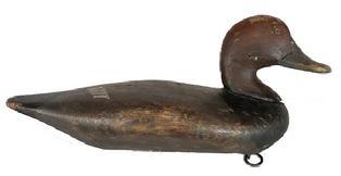 **SOLD** K2 Redhead Decoy from the Holly family - branded "RECKLESS" on bottom � bearing original painted surface. The Holly family of decoy carvers was from Havre de Grace, Harford County, Maryland.