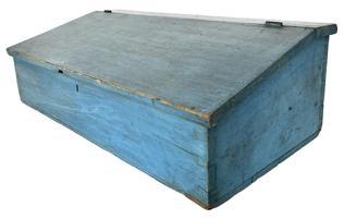 K176 Early 19th century Pennsylvania original blue painted Countertop Desk boasting dovetailed case with T and square head nail construction. The canted, hinged lid lifts to reveal a clean, natural patina interior. Circa 1820s. The wood is pine. Measurements: 34 wide x 17 3/8 deep x 10 ¾ tall (back).