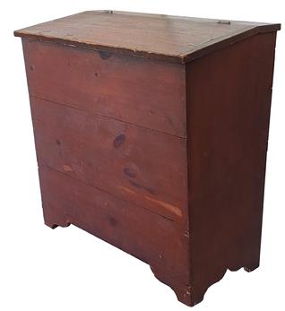C474 19th century Storage Bin from Pennslyvania, with originnal red paint, lift lid, with a slight canted front, square head nail construction, with a nice high cut out foot. circa 1870 Measurements are:37" WIDE 37 1/2" tall X 19 1/2" deep