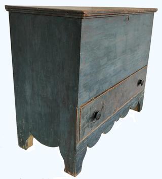 E505 Early 19th century Antique Blanket Chest over drawers in Blue Paint, Boldly Shaped Base Profile, New England, Circa 1820 White pine Rectangular top featuring applied molding over “Tee” nailed case raised on tall elliptical cutout feet, (Length: 42"; height: 34"; depth: 18 1/2