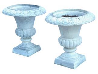 **SOLD** K277 Matching pair of small ornate Cast Iron Garden Urns retaining weathered surfaces with old white paint. Urns are solid cast iron with embossed scalloped patterned rims resting on square bases. Measurements: 12 ¼” across tops (openings are 8” diameter) x 5 ¾” square bases x 13” tall.